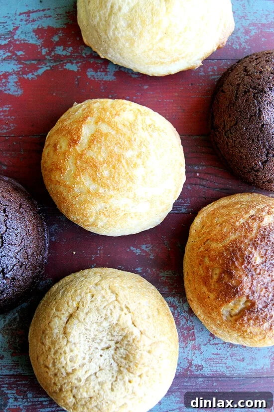The cover of the upcoming Peasant Bread Cookbook, showcasing a freshly baked loaf with various ingredients like dark chocolate, cornmeal, and lavender honey. It promises a master peasant bread recipe with exciting variations and creative ways to use fresh and day-old bread, from sandwiches to bread pudding.