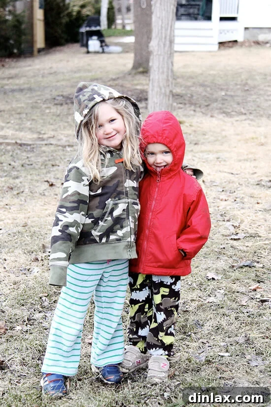 Ella and Graham, surrounded by family, enjoying the festive atmosphere and delicious smells of Greek Easter.