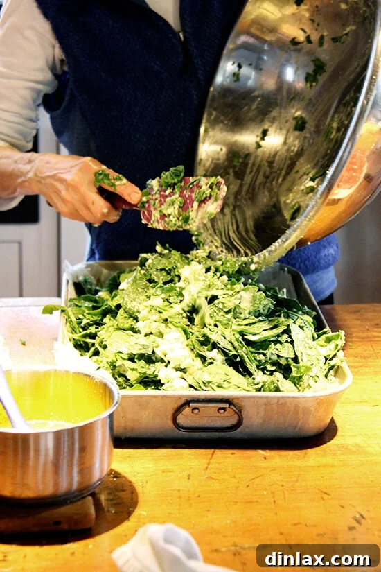 Close-up of Marcy's hands expertly working the pita dough, a true labor of love.