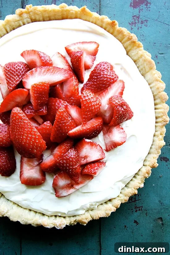 Delicious Strawberry Mascarpone Tart with fresh berries, perfect for summer.