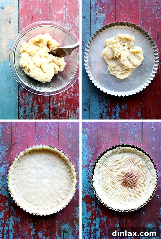 Process of pressing the dough into the tart pan with fingertips.