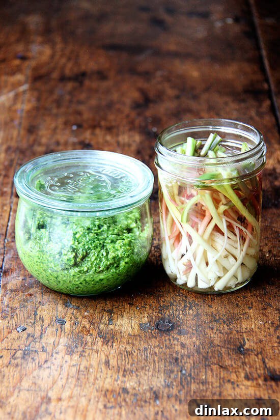 Ramp Pesto Pizza and Pickled Ramps 16 A collection of ramp creations: a bowl of ramp pesto and a jar of pickled ramp bulbs.