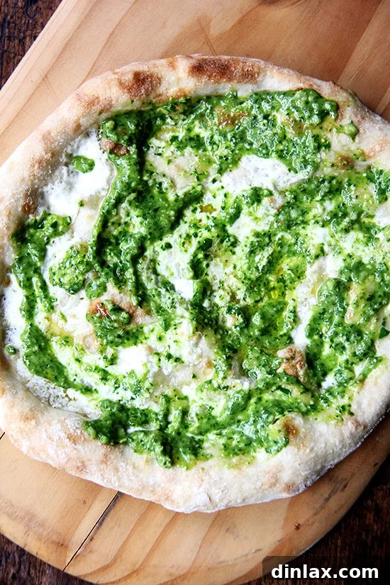 Ramp Pesto Pizza and Pickled Ramps 10 Finished ramp green pesto pizza, topped with fresh pesto and ready to be served.