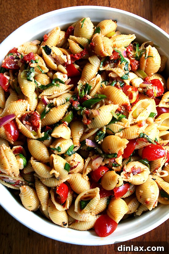 Kristina's simple and delicious pasta salad, a classic crowd-pleaser for any gathering.
