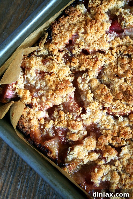 A comforting rhubarb buckle with a sweet crumb topping, a classic spring dessert.