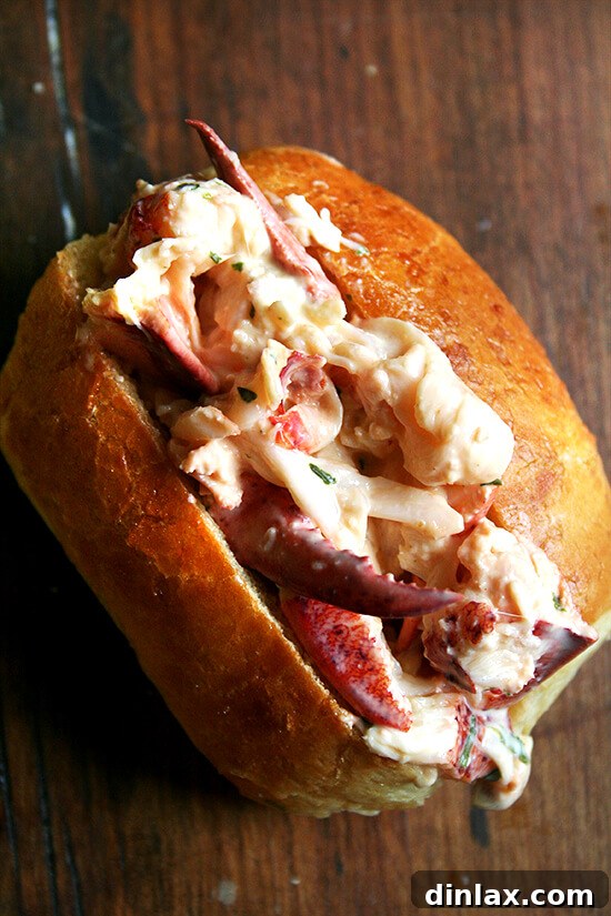 Exquisite lobster rolls, filled with fresh lobster meat and homemade tarragon mayonnaise, served in toasted buns.
