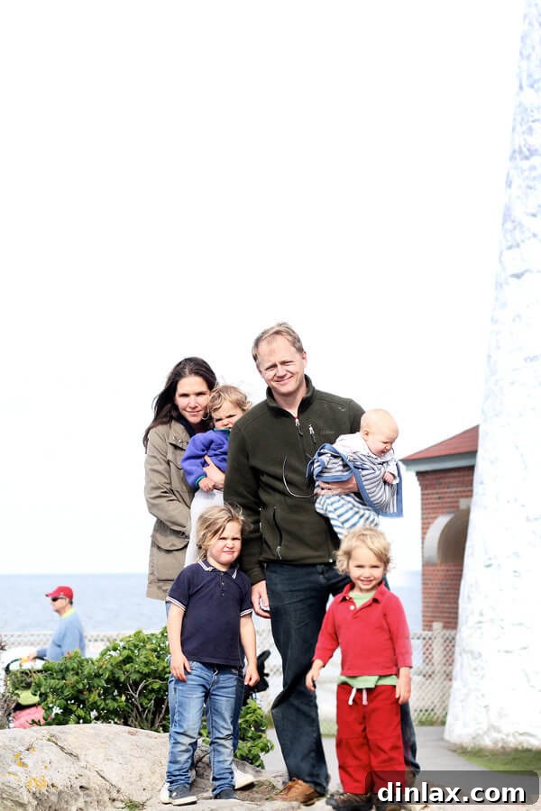 A family enjoying their time together in Maine, capturing a moment of shared joy and connection.