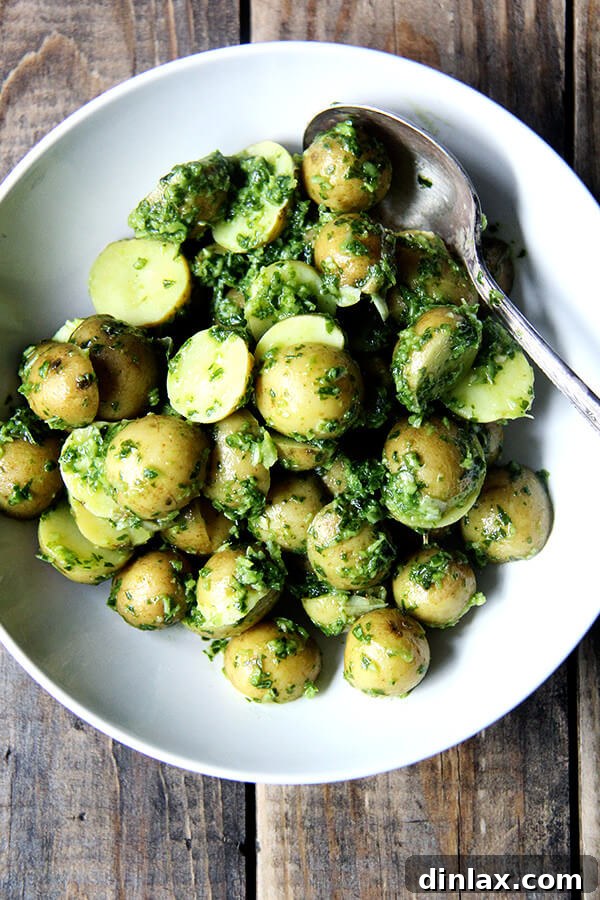 Green harissa new potatoes on a buffet table, vibrant and fresh