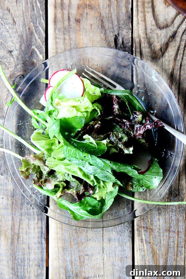 CSA Week 2 Making the Most of Simple Creme Fraiche Dressing Turnip Burgers and Bok Choy 5 Salad on a plate