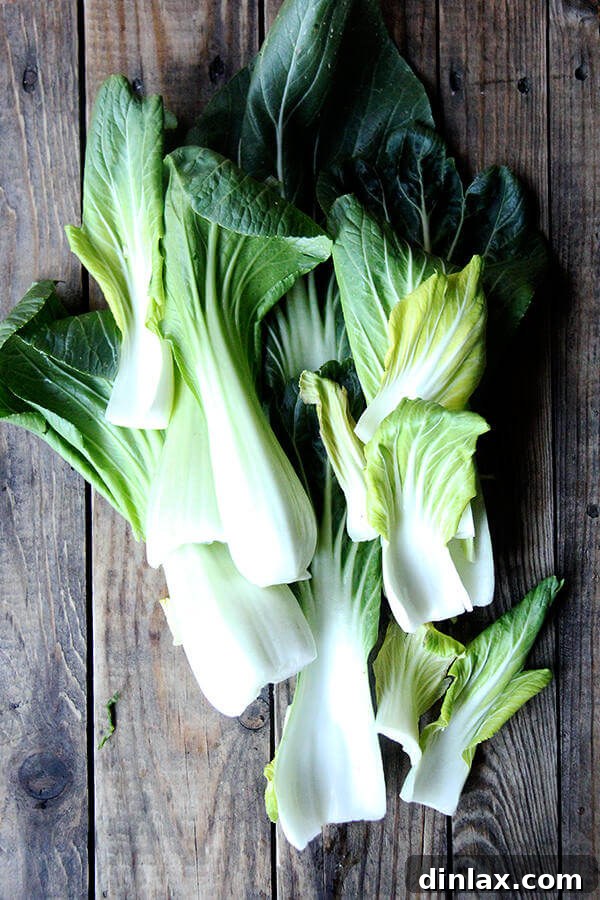 Detailed view of individual bok choy leaves, showing their crisp texture.