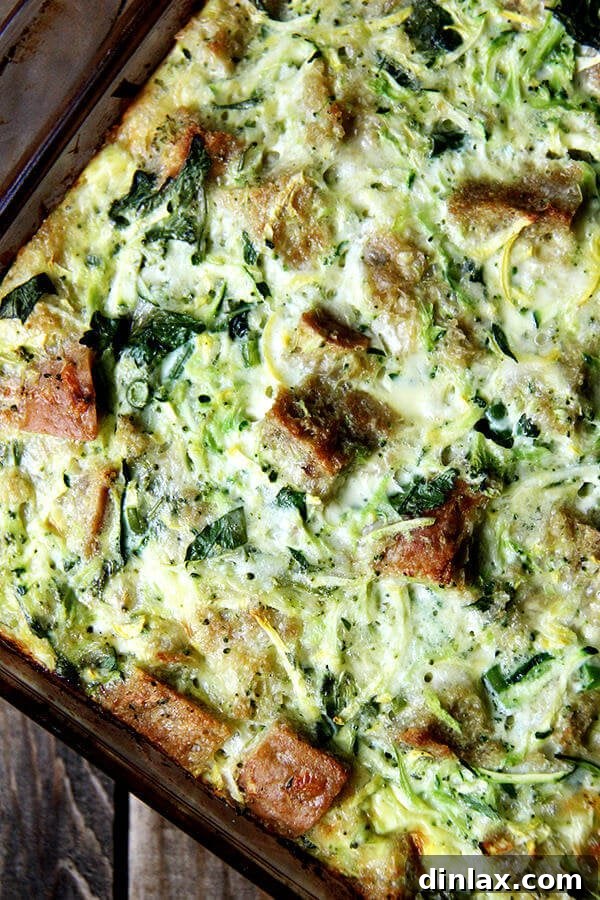 A glorious close-up of the golden-brown Summer Vegetable Strata, highlighting its rich texture and savory appeal.