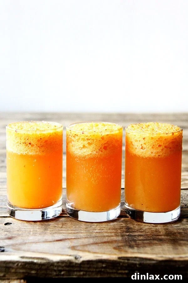 Light, summery, and refreshing peach Bellini made with whole peaches, perfect for a festive weekend brunch.