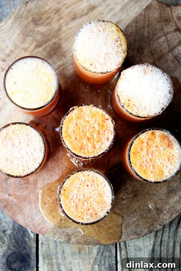 A playful 'oops' moment while pouring Prosecco for a Bellini