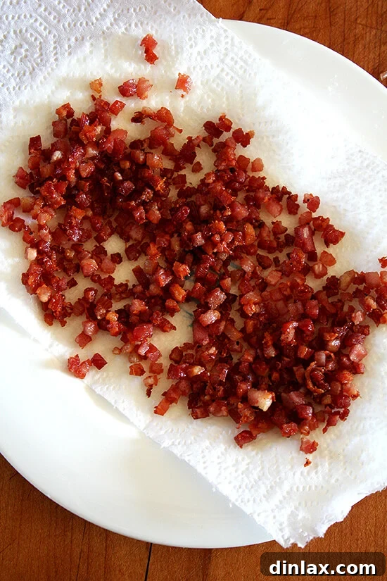 Crispy, golden brown pancetta, removed from the pot and drained, ready to be sprinkled over the finished soup.