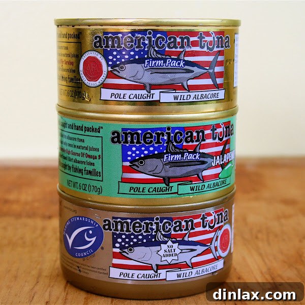 Close-up of a perfectly toasted American Tuna melt, showing rich filling