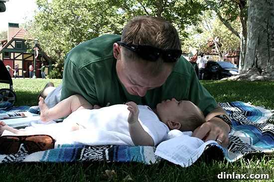 Ben and Rebeka sharing a sweet and candid moment in Solvang, capturing the joy of family travel and exploration against a charming backdrop.