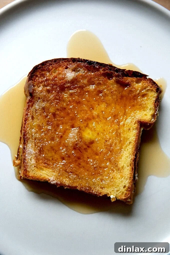 Overnight French Toast, beautifully garnished and ready to serve, showcasing its golden crust and fluffy texture.