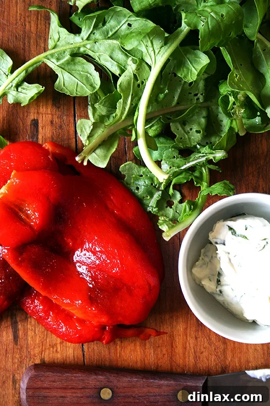 Roasted Red Peppers, fresh Arugula, and Herbed Goat Cheese, the delicious fillings