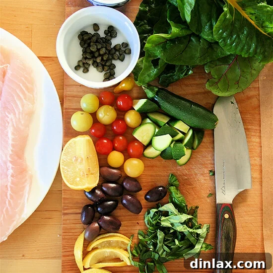 A close-up of a perfectly cooked fish en papillote, revealing flaky, moist fish served elegantly with accompanying vibrant vegetables.