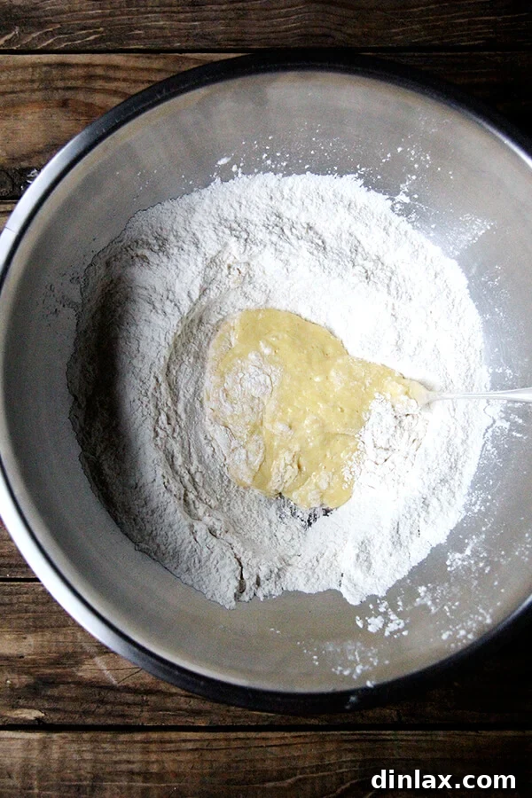 whisking the egg into the flour mixture