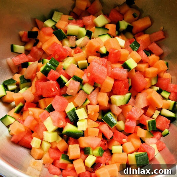 Summer Melon Cucumber Delight 3 Close-up of freshly diced honeydew, cantaloupe, and watermelon, vibrant and ready for the salad.