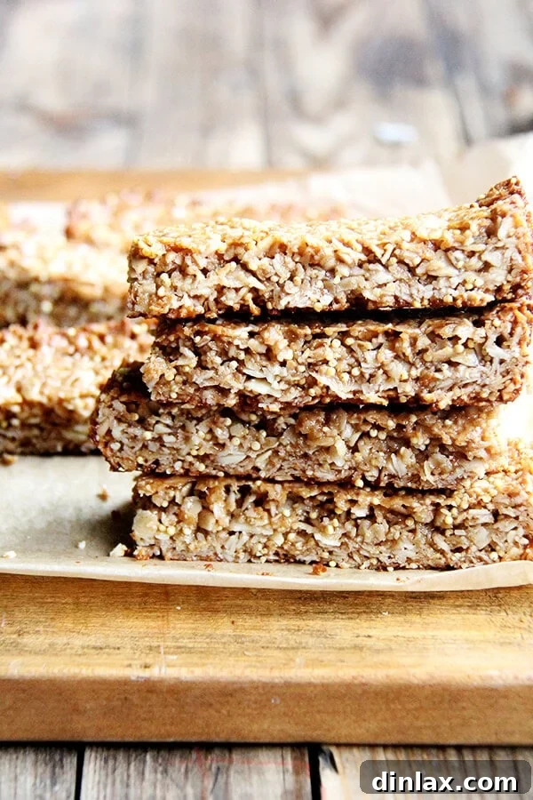 Homemade Coconut-Almond Granola Bars: Your New Favorite Lunch Box Snack Delicious and healthy homemade coconut almond granola bars, packed with oats, coconut, almonds, and millet. A perfect back-to-school lunchbox staple, held together with natural sweeteners and almond butter. // alexandracooks.com