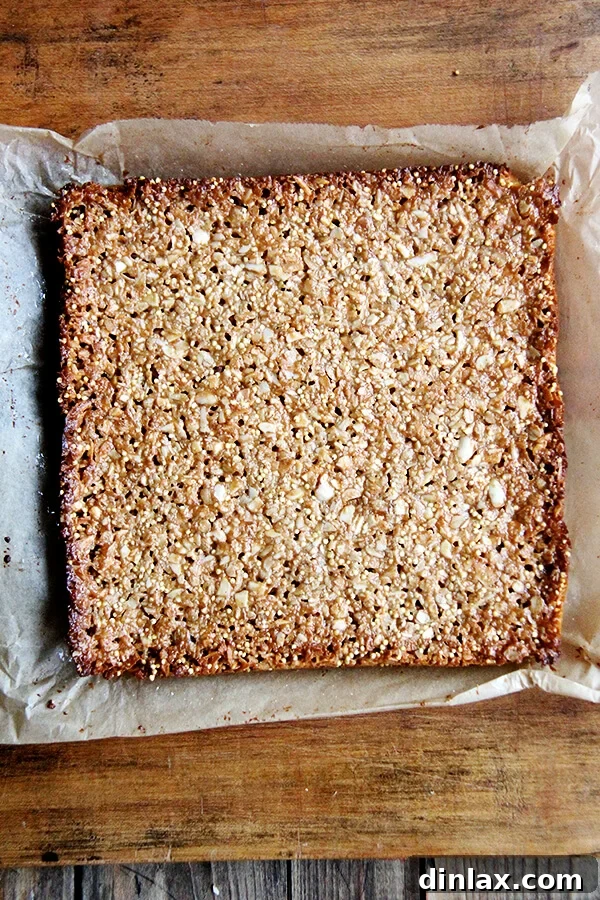 Homemade Granola Bars for Back-to-School 12 Freshly baked coconut almond granola bars, golden brown and perfectly set.