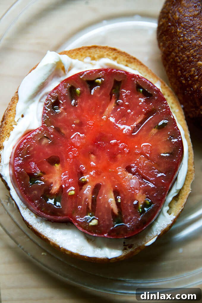 Vibrant heirloom tomatoes on a wooden surface, ready for culinary use