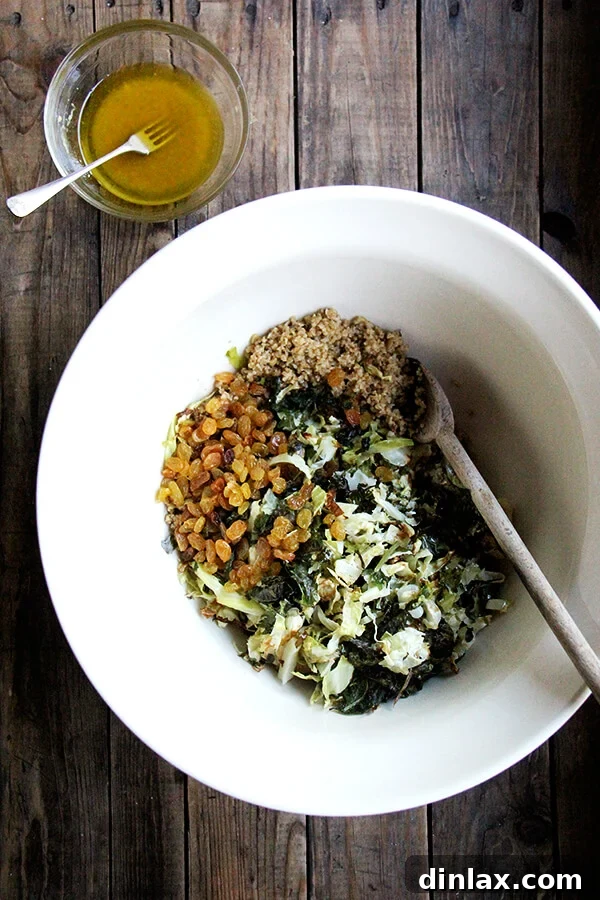 Freekeh Salad with Roasted Kale & Cabbage - Ready to Serve The final Freekeh Salad, beautifully assembled with roasted kale and cabbage, dressed and ready to be served. It's a light yet comforting meal, perfect for any time of year. alexandracooks.com