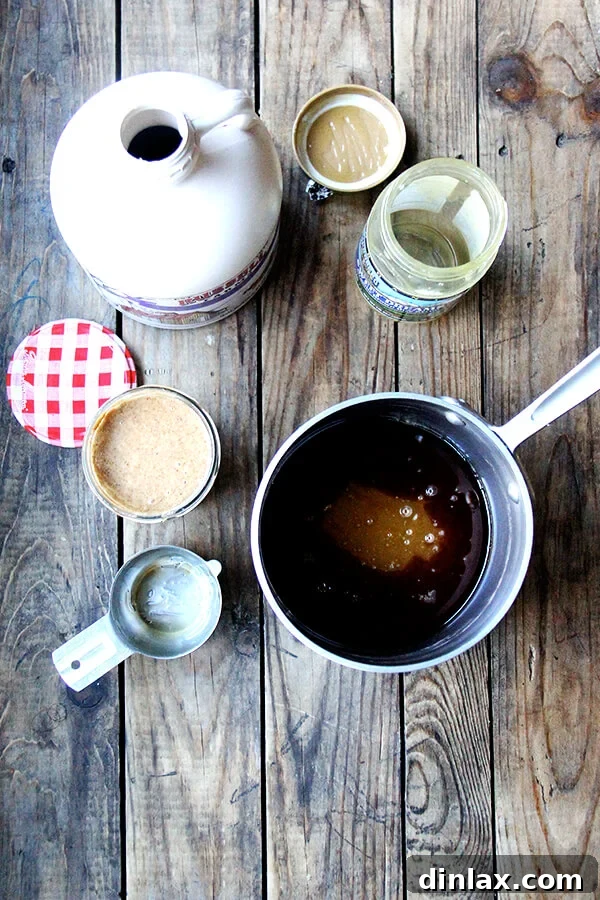 A collection of essential Fair Trade ingredients for Hippie Crispy Treats, including rich chocolate chips, organic coconut oil, and crisp rice cereal, ready for preparation.