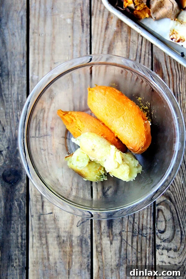 A bowl filled with cooked, peeled sweet potatoes, ready to be mashed and combined with the vibrant seasonings. The soft flesh is perfect for absorbing flavors.