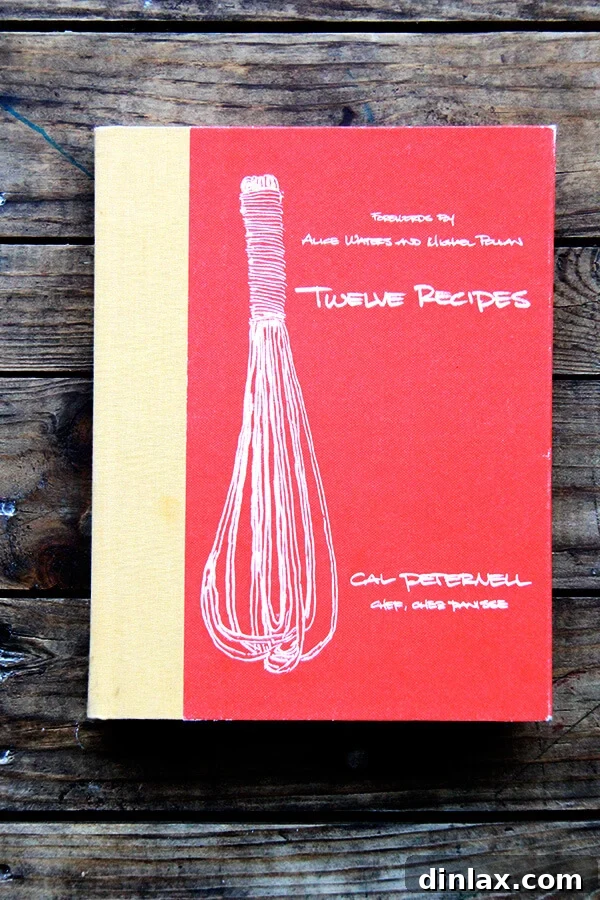 The cover of Cal Peternell's cookbook, 'Twelve Recipes', a highly recommended culinary guide that promotes simplicity, improvisation, and learning from kitchen experiences. The book is open, suggesting a journey into its rich content and inspiring recipes.