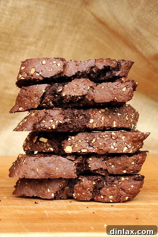 Delicious chocolate biscotti, perfectly sweet, crumbly yet tender, loaded with chocolate chips and studded with almonds. Ideal with a cup of coffee.