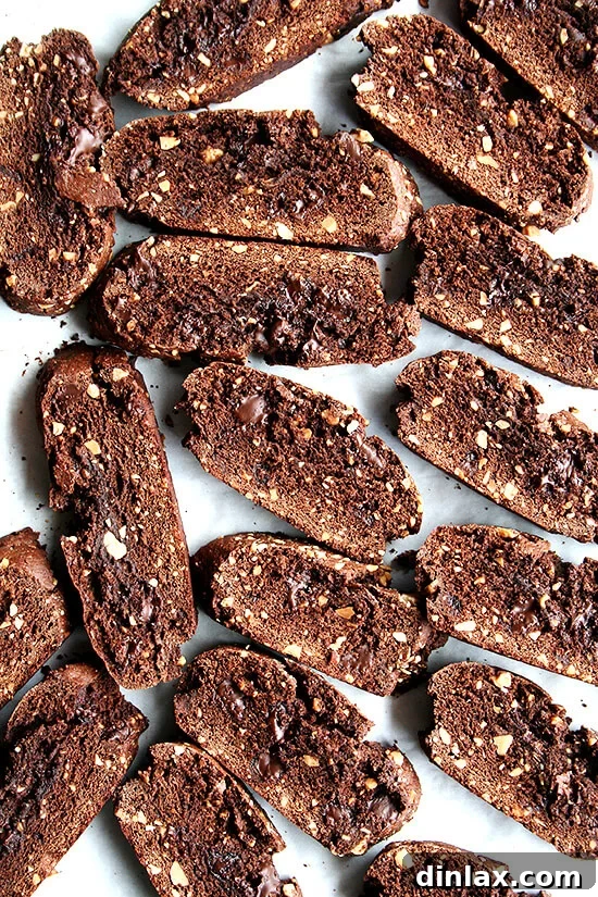 A stunning plate of chocolate biscotti, ready for enjoyment. Perfectly sweet, not too hard, crumbly, soft, and rich with chocolate and almonds.