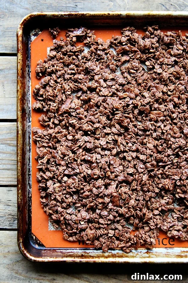 A sheet pan of cooled, freshly baked homemade cocoa crunch, ready to be broken into pieces.