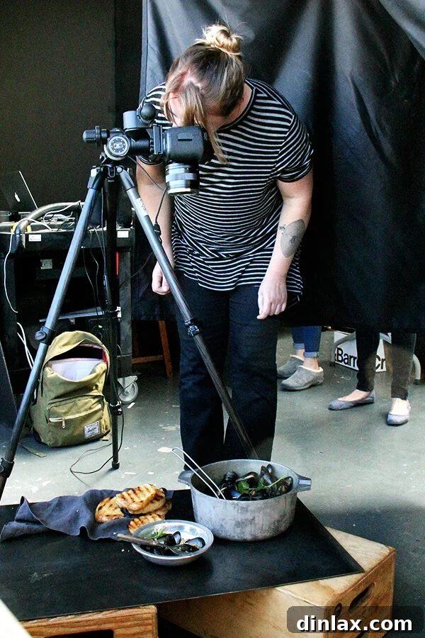 Cookbook Shoot Secrets and Bay Area Food Finds 2 A vibrant display of food photography props, including kitchen utensils and fresh ingredients, set against a bright backdrop, hinting at the creative process behind a cookbook shoot.
