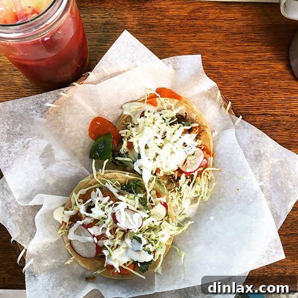Cookbook Shoot Secrets and Bay Area Food Finds 12 Two delicious tacos, one fish and one carnitas, alongside an agua fresca, served at Cholita Linda in Oakland.