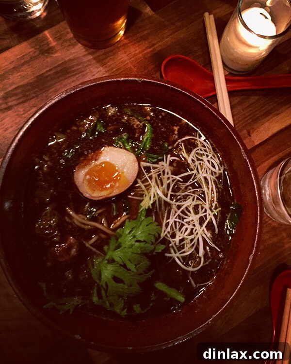 Cookbook Shoot Secrets and Bay Area Food Finds 15 A steaming bowl of expertly crafted ramen with rich broth, noodles, egg, and pork belly, served at Ramen Shop.