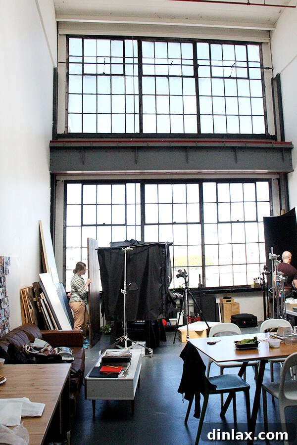 Cookbook Shoot Secrets and Bay Area Food Finds 5 A bright, sunlit studio space with large windows, indicating a professional photography studio setting.