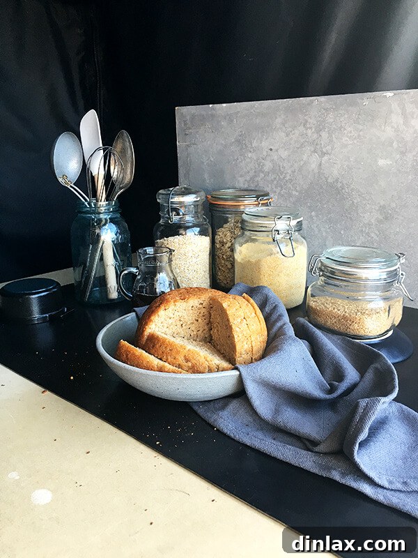 Cookbook Shoot Secrets and Bay Area Food Finds 10 A beautifully baked loaf of oatmeal-maple bread, perfectly sliced to reveal its moist texture, ready for a close-up photo.