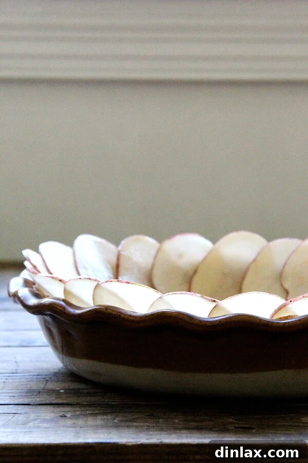 The partially baked potato crust, golden brown and ready for the custard filling.