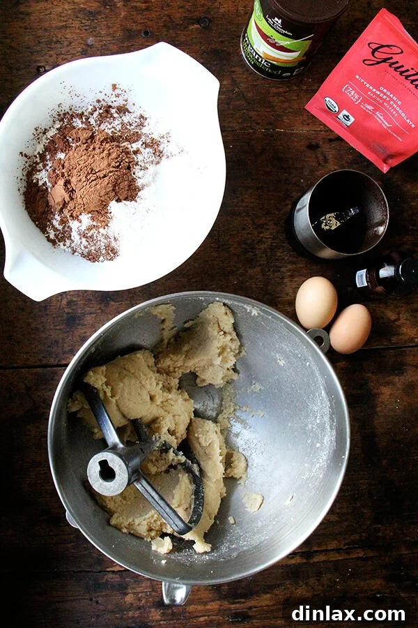 An array of ingredients laid out on a kitchen counter, ready for baking double chocolate espresso cookies.