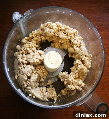 Close-up of the peach and blueberry filling, vibrant and ready for baking.