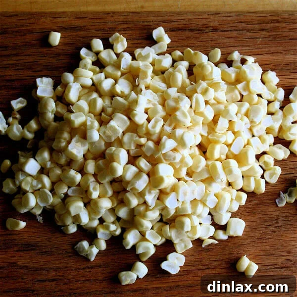 Corn Pudding Batter The smooth, creamy corn pudding batter prepared and ready for baking in a small dish.