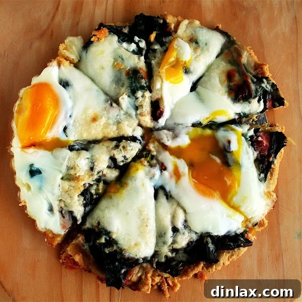 The toppings on this Swiss chard tart include sautéed chard with garlic, grated cheese, and a couple of eggs — a combination I really adore, in a buttery, cornmeal tart shell. It NEVER fails to please. The toppings on this Swiss chard tart include sautéed chard with garlic, grated cheese, and a couple of eggs — a combination I really adore, in a buttery, cornmeal tart shell. It NEVER fails to please.