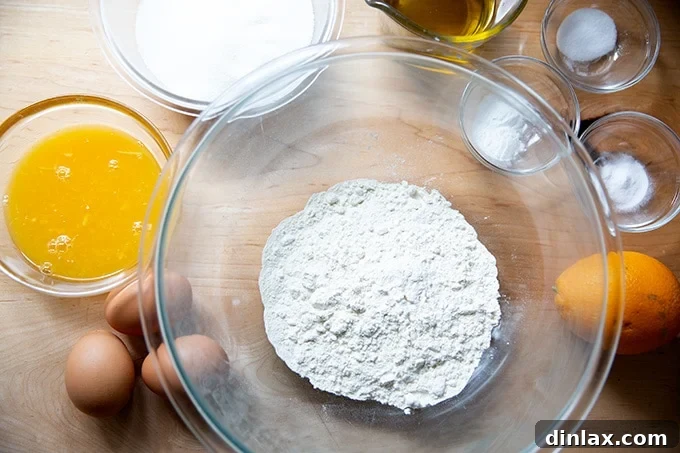 All the necessary ingredients laid out for making the orange and olive oil cake.