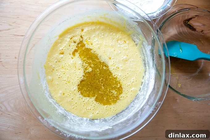 A bowl of luscious orange and olive oil cake batter, smooth and ready for the pan.