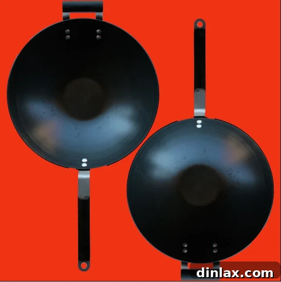 A traditional wok heating up on a stovetop, ready for high-heat stir-frying.