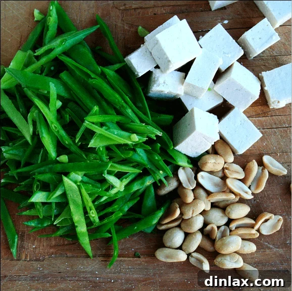 A selection of non-farmers' market stir-fry add-ins, including tofu, showcasing diverse protein options.