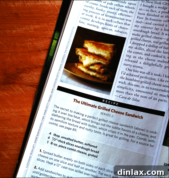 A cast-iron skillet perfectly browning a grilled cheese sandwich, illustrating the ideal low-heat cooking method for a crispy exterior. (Image inspired by alexandracooks.com)
